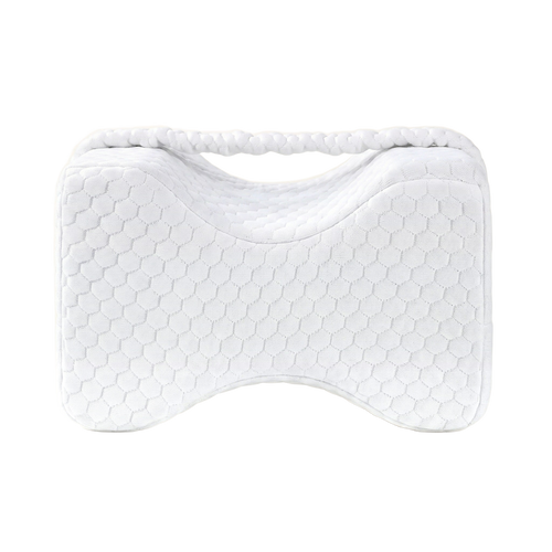 Coussin cale-genoux Maison Reposéa vu de profil : silhouette en sablier et double échancrure pour les genoux